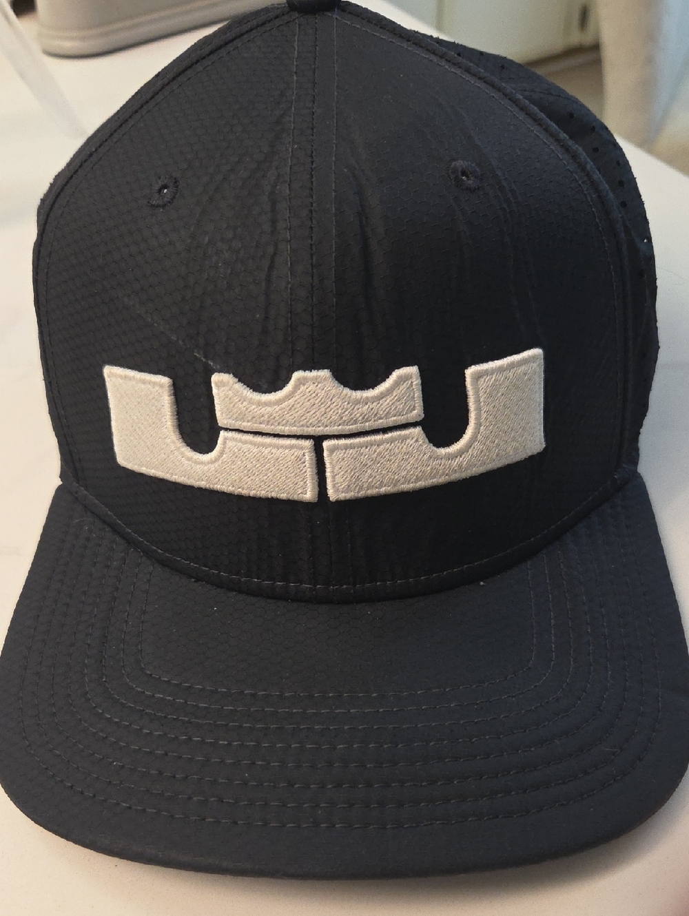 Nike Black Snapback Hat with White Polka Dot Lining